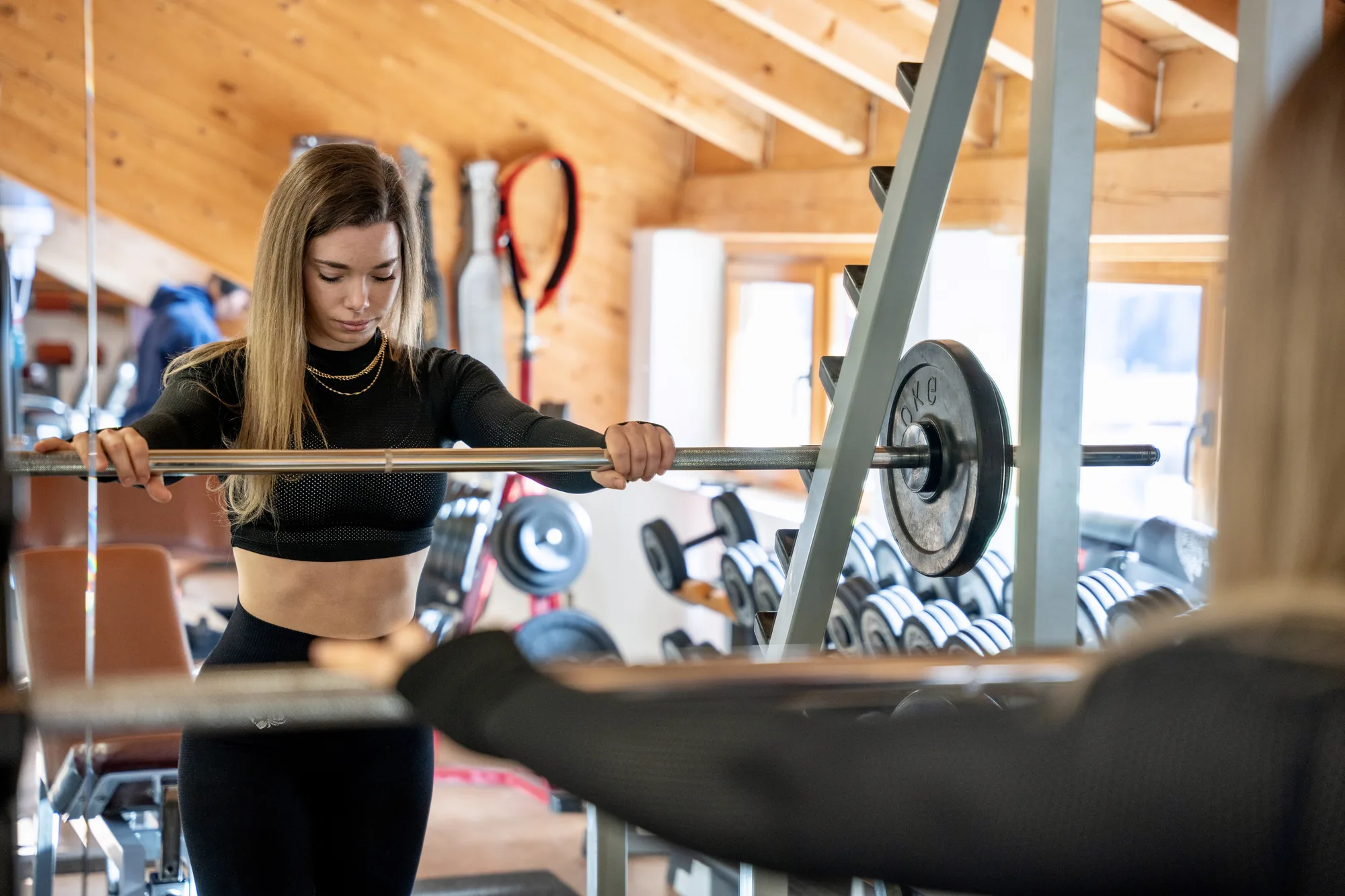Loaded barbell on the rack in the weights room in Val Gardena